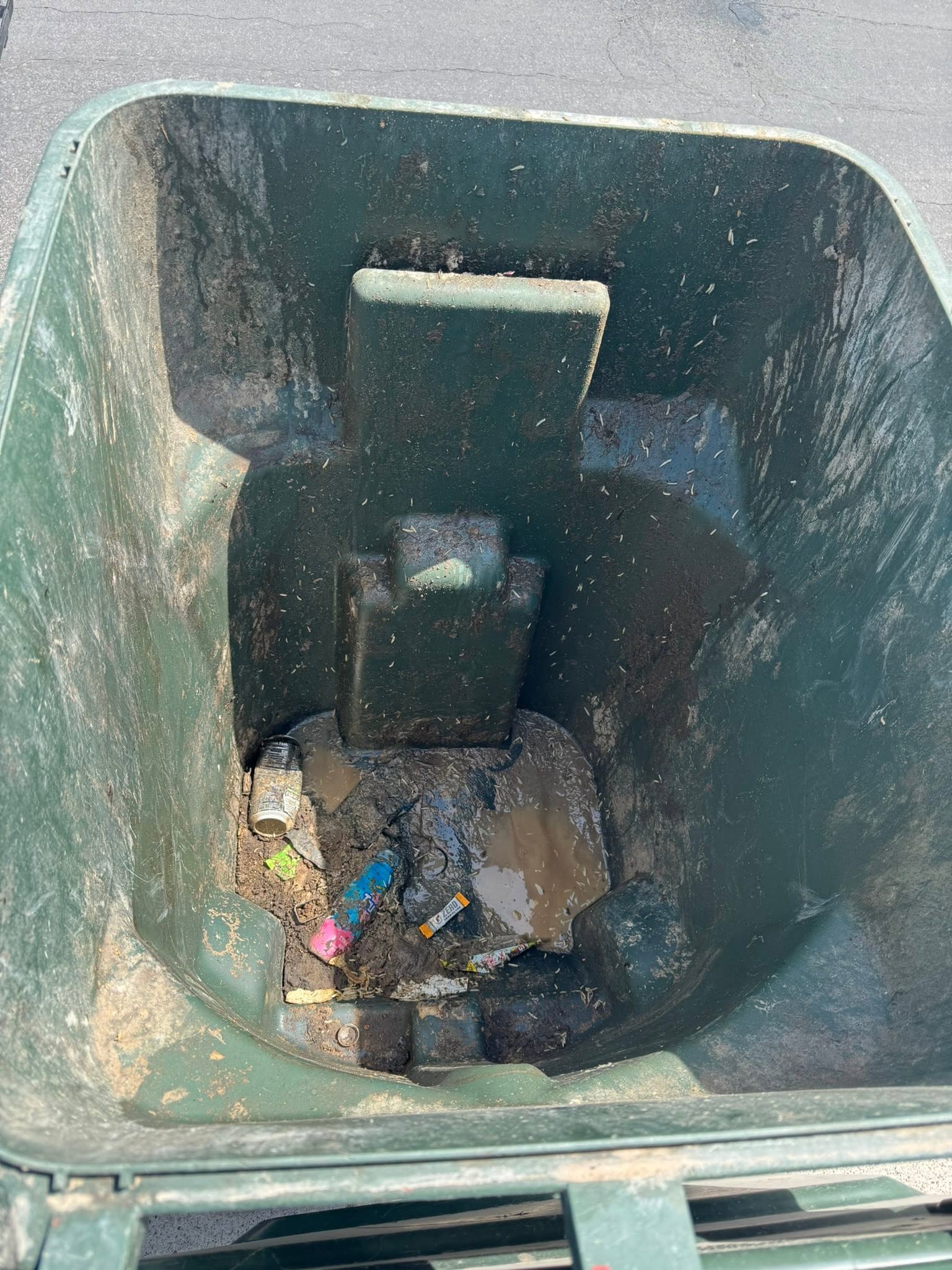 Grimy trash can interior before cleaning in Pocatello, Idaho